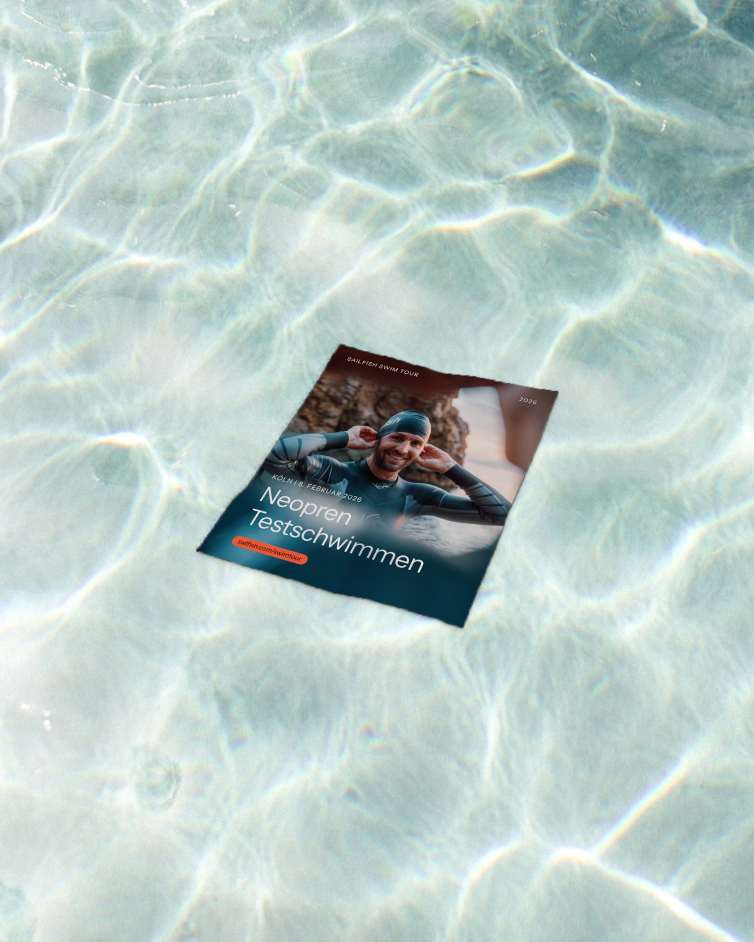 Graphic of a typography specimen showing the alphabet and numerals on top of a dark gray background.