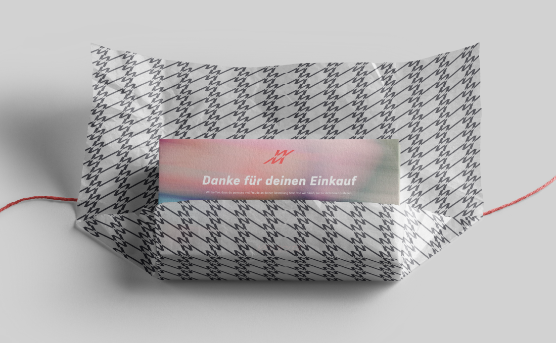 Stationery design of letterhead and business cards for the company Anders on top of a blurred photo of a house interior.