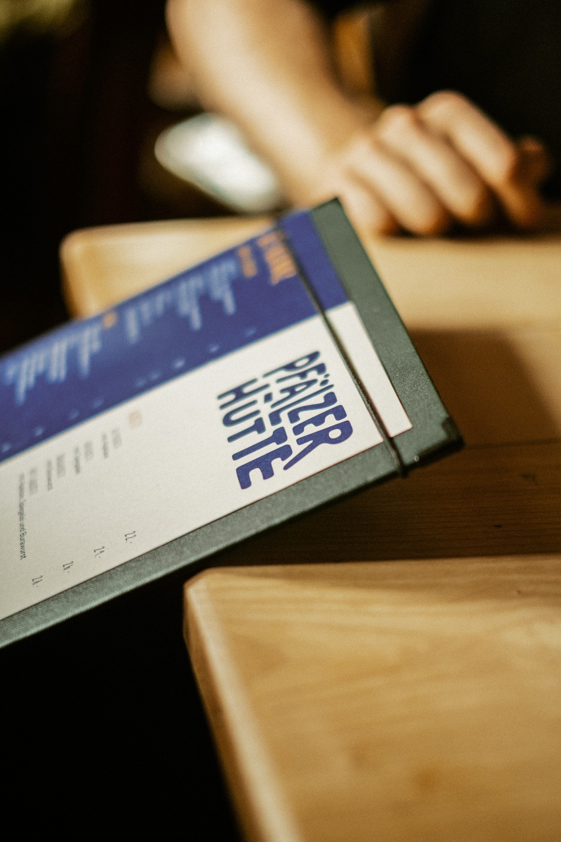 Graphic of a close up of a website depicting an Our Projects page with sample project names and dates.