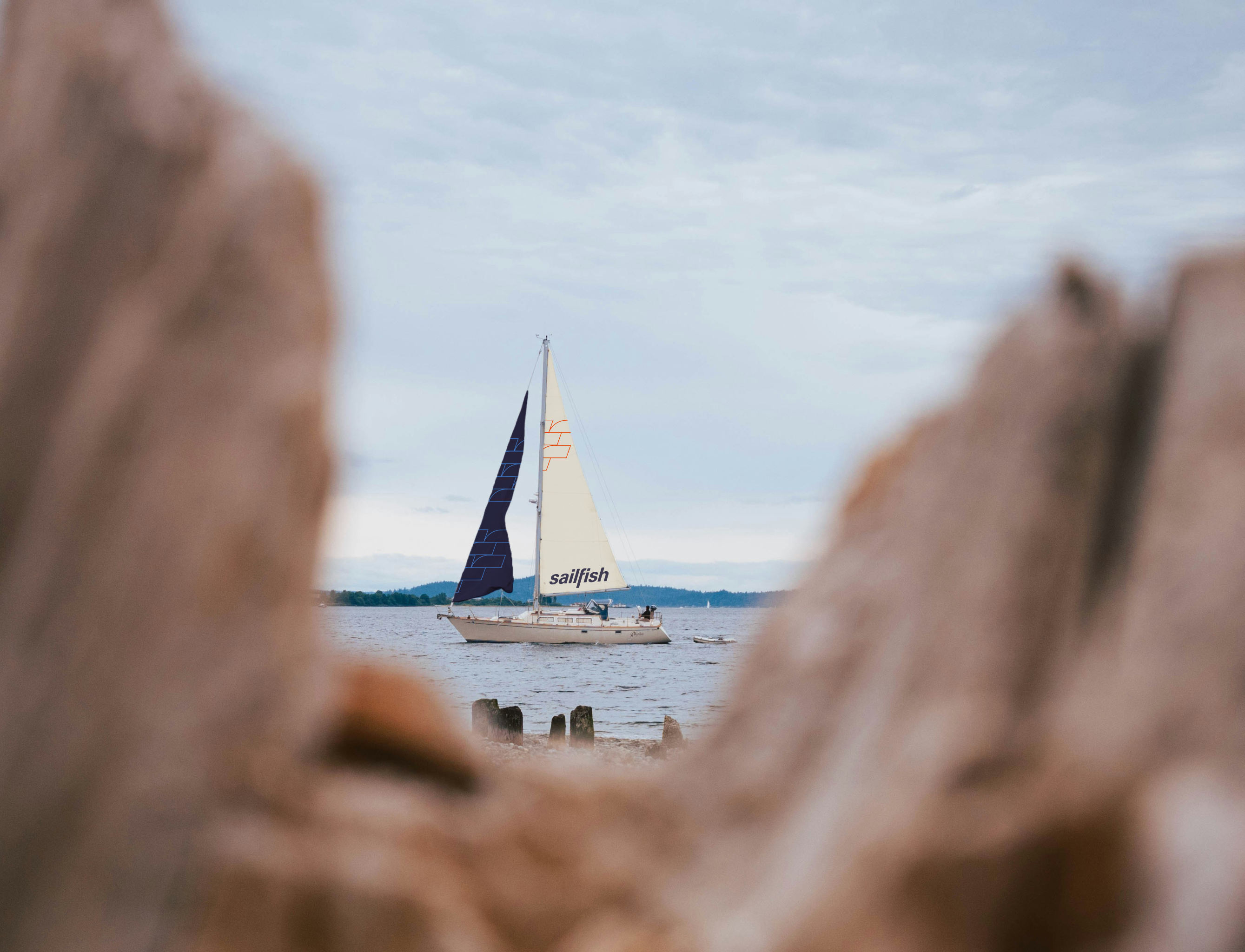 Stationery design of letterhead and business cards for the company Anders on top of a blurred photo of a house interior.
